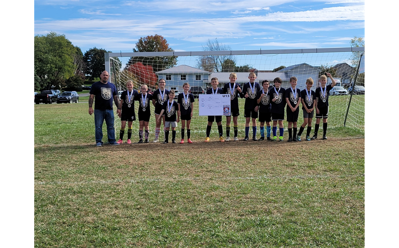 U13 Team with Coach Gassner at Clash of the Cleats Fall 2025